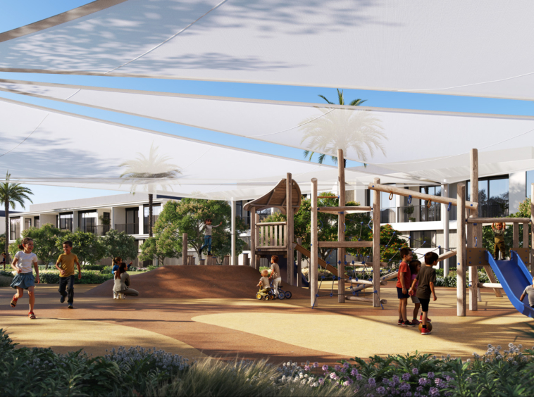 A modern adventure playground with wooden climbing structures and shaded play areas at Greenspoint, Emaar South.3 & 4 Bedroom Townhouses at Greenspoint, Emaar South